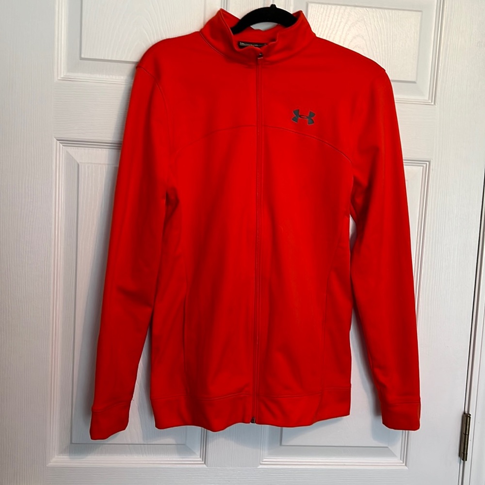 ORANGE, UNDER AMOUR, ZIPPERED FRONT, SIDE POCKETS, SIZE YXL, LONG SLEEVES JACKET